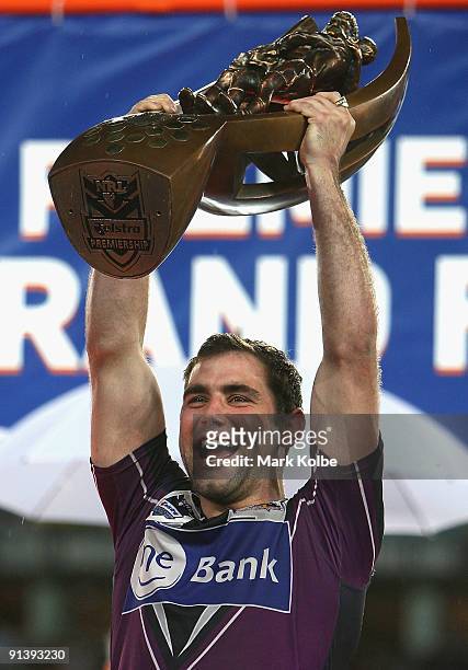 Cameron Smith of the Melbourne Storm holds aloft the trophy after their victory in the 2009 NRL Grand Final match between the Parramatta Eels and the...