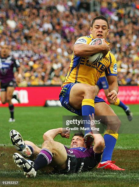 Jarryd Hayne of the Eels is tackled in goal by Cooper Cronk of the Storm during the 2009 NRL Grand Final match between the Parramatta Eels and the...