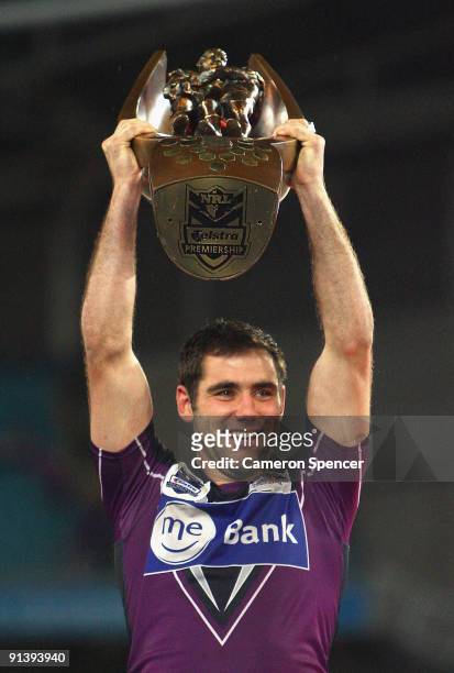 Storm captain Cameron Smith holds the NRL Premiership trophy aloft after winning the 2009 NRL Grand Final match between the Parramatta Eels and the...