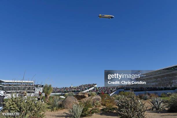 The Goodyear blimp flies over the 16th hole during the third round of the Waste Management Phoenix Open at TPC Scottsdale on February 3, 2018 in...