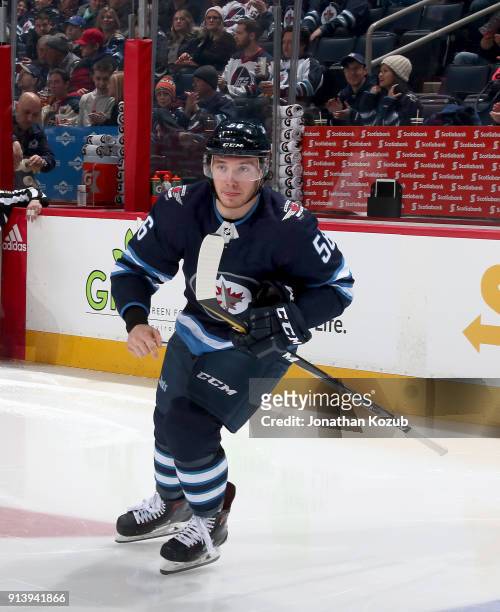 Marko Dano of the Winnipeg Jets hits the ice prior to puck drop against the Colorado Avalanche at the Bell MTS Place on February 3, 2018 in Winnipeg,...