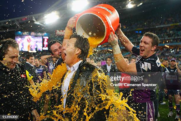 Storm coach Craig Bellamy has Gatorade poured over him after the 2009 NRL Grand Final match between the Parramatta Eels and the Melbourne Storm at...