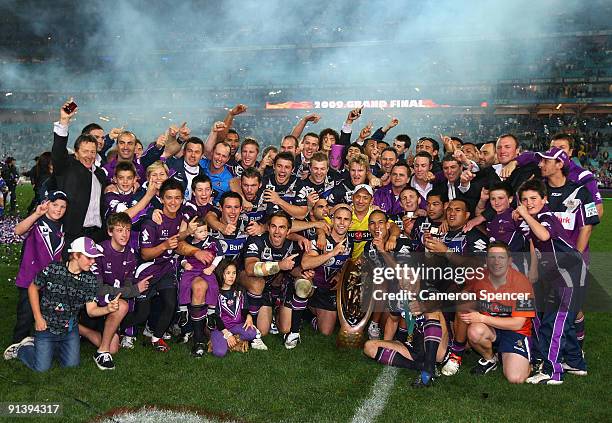 Storm players celebrate witht the trophy after the 2009 NRL Grand Final match between the Parramatta Eels and the Melbourne Storm at ANZ Stadium on...