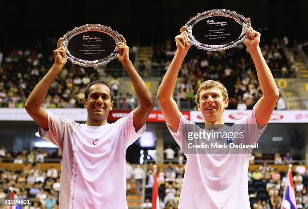 Rajeev Ram and Eric Butorac of the USA hold their 2009 PTT Thailand Open Doubles trophies after defeating Guillermo Garcia-Lopez of Spain and Mischa...