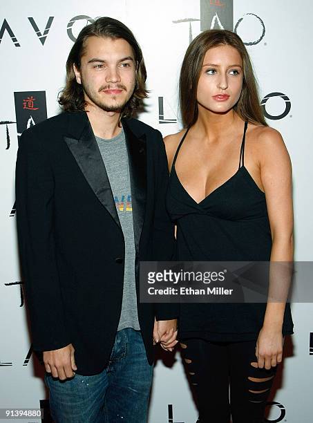 Actor Emile Hirsch and his girlfriend Brianna Domont arrive at the Tao Nightclub at the Venetian Resort Hotel Casino during the club's fourth...