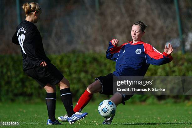Lina Magull of Westfalen and Denise Depken of Bremen battle for the ball during the Women's U17 Federal State Cup at the Sportschule Wedau on October...