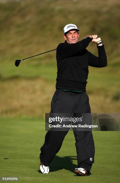 Musician Huey Lewis drives off the fifth tee during the third round of The Alfred Dunhill Links Championship at Kingsbarns Golf Links on October 4,...