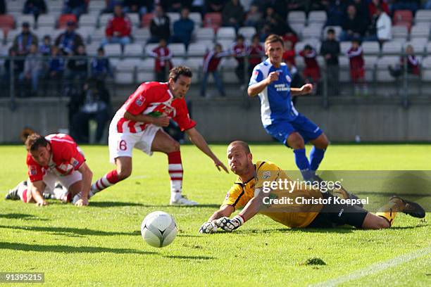 Goalkeeper Sascha Kirschstein of Ahlen saves the ball during the Second Bundesliga match between Rot-Weiss Ahlen and Hansa Rostock at the Werse...