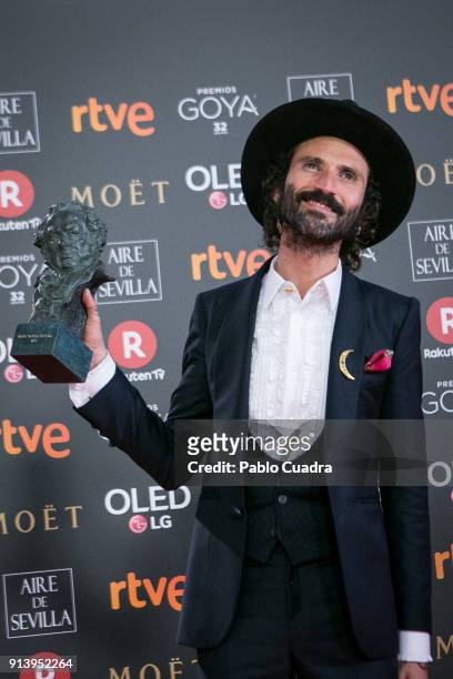 Leiva holds the Best original Song award for the film 'La Libreria' during the 32nd edition of the Goya Cinema Awards at Madrid Marriott Auditorium...