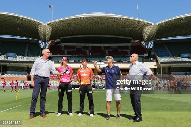 Ellyse Perry of the Sixers and Elyse Villani of the Scorchers look on as the coin is tossed during the Women's Big Bash League final match between...