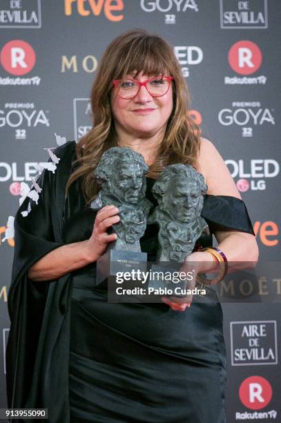 Director Isabel Coixet holds the best adspted screenplay and the best director awards for the film la Libreria during the 32nd edition of the Goya...