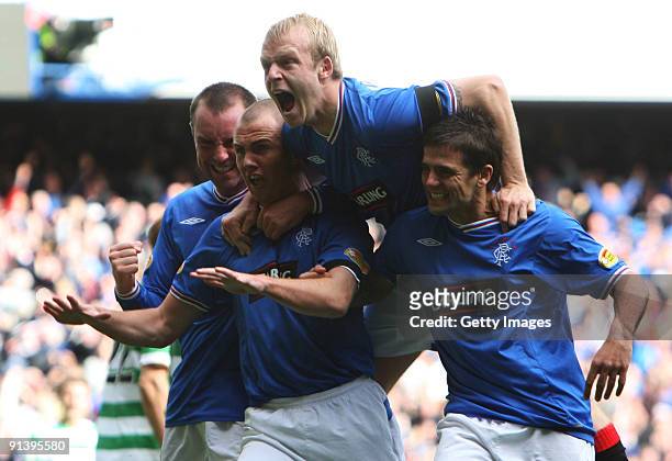 Kenny Miller of Rangers celebrates his second goal with Kris Boyd, Steven Naismith and Nacho Novo during the Clysdale Bank Scottish Premier League...