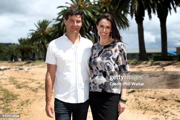 Prime Minister Jacinda Ardern poses with her partner Clarke Gayford on February 4, 2018 in Waitangi, New Zealand. Ardern and Gayford are expecting...