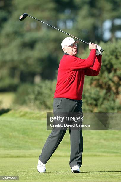 Sir Bobby Charlton of England plays his tee shot at the 15th hole during the third round of the Alfred Dunhill Links Championship at Carnoustie Golf...