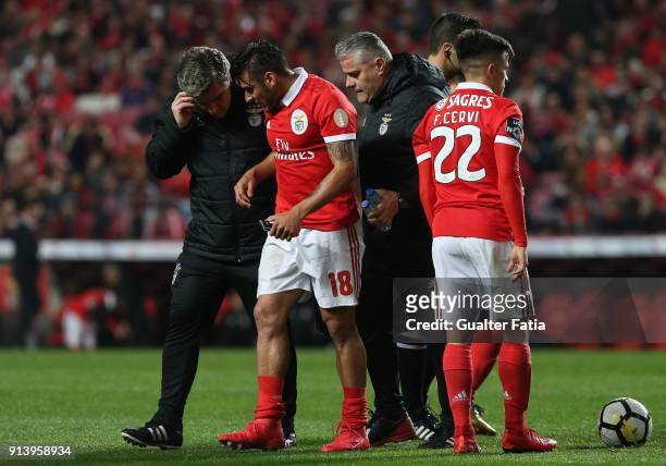 Benfica forward Eduardo Salvio from Argentina leaves the pitch injured with the medical staff during the Primeira Liga match between SL Benfica and...