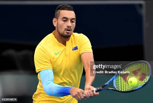 Nick Kyrgios of Australia plays a backhand against Alexander Zverev of Germany during the Davis Cup World Group First Round tie between Australia and...