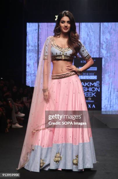 Showstopper Nidhhi Agerwal presents the collection of Designer Shloka Sudhakar at Lakme Fashion Week Summer Resort 2018 at Jio Garden in Mumbai.