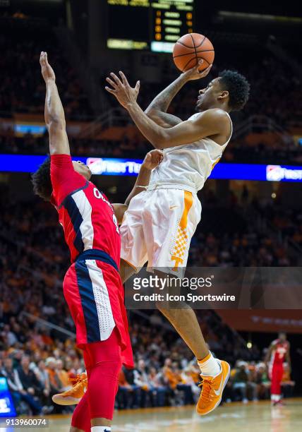 Tennessee Volunteers guard Jordan Bowden shooting over Mississippi Rebels guard Breein Tyree during a game between the Mississippi Rebels and...