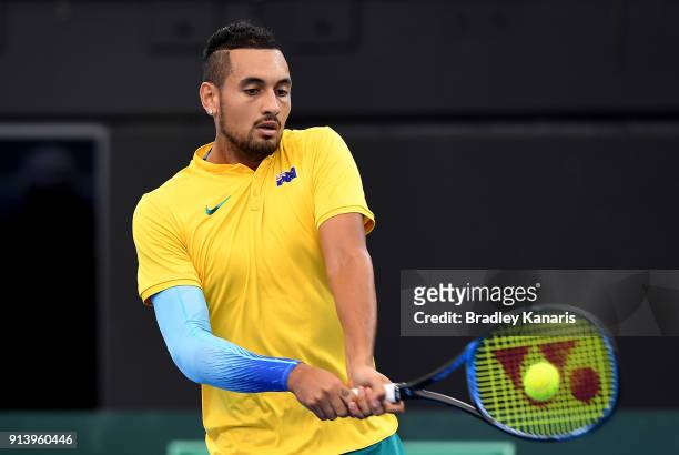 Nick Kyrgios of Australia plays a backhand against Alexander Zverev of Germany during the Davis Cup World Group First Round tie between Australia and...
