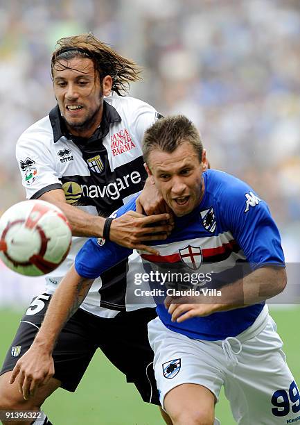 Antonio Cassano of UC Sampdoria competes for the ball with Cristian Zaccardo of Parma FC during the Serie A match between UC Sampdoria and Parma FC...