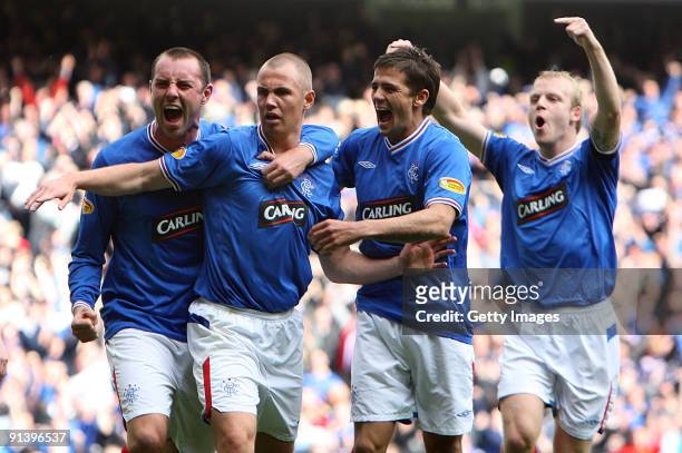 Kenny Miller of Rangers celebrates his second goal with Kris Boyd, Nacho Novo and Steven Naismith during the Clysdale Bank Scottish Premier League...