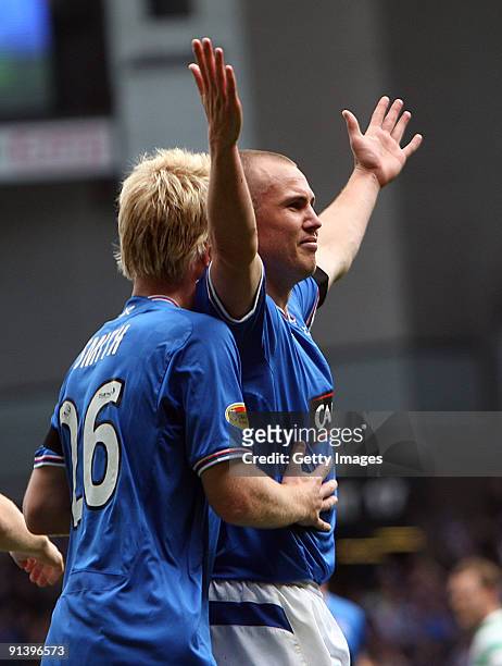 Kenny Miller of Rangers celebrates his second goal with Steven Smith during the Clysdale Bank Scottish Premier League match between Rangers and...