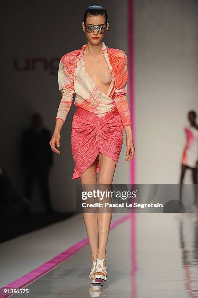 Model walks the runway during the Emmanuel Ungaro Pret a Porter show as part of the Paris Womenswear Fashion Week Spring/Summer 2010 at Le Carrousel...