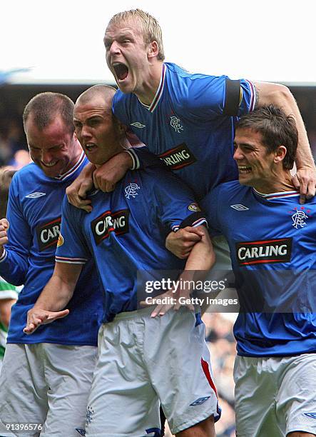 Kenny Miller of Rangers celebrates his second goal with Kris Boyd, Steven Naismith and Nacho Novo during the Clysdale Bank Scottish Premier League...