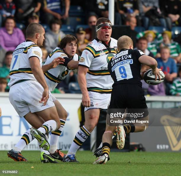 Joe Simpson of Wasps takes on the blooded Dylan Hartley during the Guinness Premiership match between London Wasps and Northampton Saints at Adams...