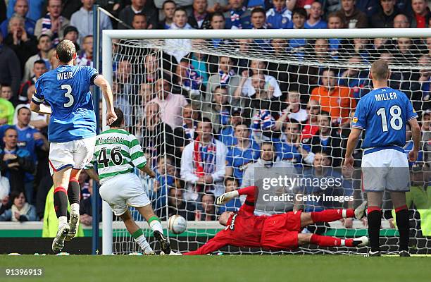 Aiden McGeady of Celtic scores a penalty past Allan McGregor of Rangers during the Clydesdale Bank Scottish Premier League match between Rangers and...