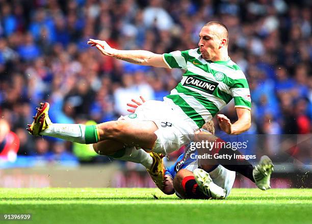 Scott Brown of Celtic and Steven Whittaker of Rangers in action during the Clydesdale Bank Scottish Premier League match between Rangers and Celtic...