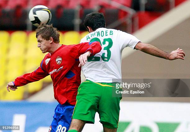Tomas Necid of PFC CSKA Moscow battles for the ball with Georgi Dzhioyev of FC Kuban Krasnodar during the Russian Football League Championship match...