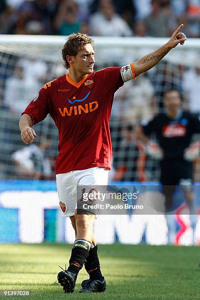 Francesco Totti of AS Roma celebrates the opening goal during the Serie A match between AS Roma and SSC Napoli at Olimpico Stadium on October 4, 2009...