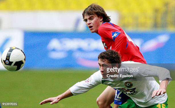 Georgi Schennikov of PFC CSKA Moscow battles for the ball with Maksim Zhavnerchik of FC Kuban Krasnodar during the Russian Football League...