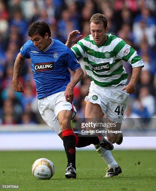Aiden McGeady of Celtic and Nacho Novo of Rangers in action during the Clydesdale Bank Scottish Premier League match between Rangers and Celtic at...