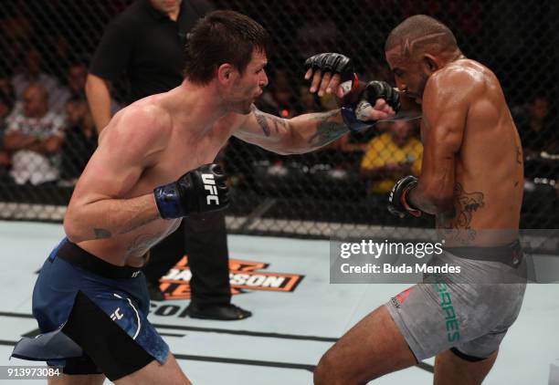 Tim Means punches Sergio Moraes of Brasil in their welterweight bout during the UFC Fight Night event at Mangueirinho Arena on February 03, 2018 in...