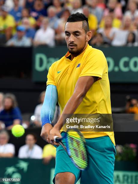 Nick Kyrgios of Australia plays a backhand in the match against Alexander Zverev of Germany during the Davis Cup World Group First Round tie between...
