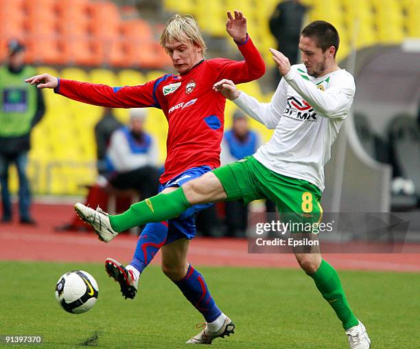 Milos Krasic of PFC CSKA Moscow battles for the ball with Artur Tlisov of FC Kuban Krasnodar during the Russian Football League Championship match...