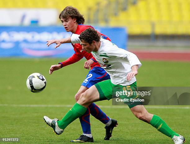 Georgi Schennikov of PFC CSKA Moscow battles for the ball with Maksim Zhavnerchik of FC Kuban Krasnodar during the Russian Football League...