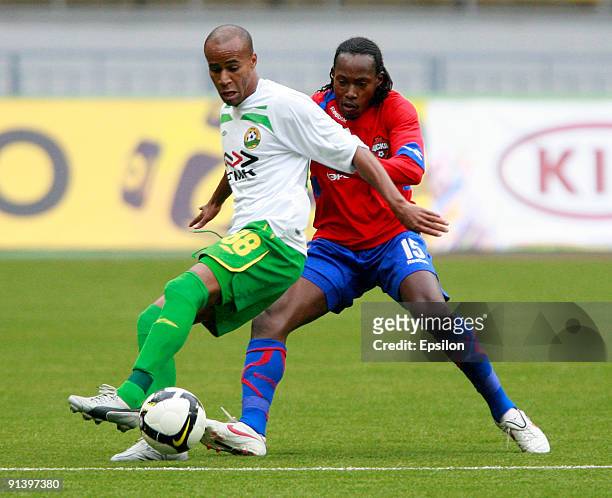 Chidi Odiah of PFC CSKA Moscow battles for the ball with William Boaventura of FC Kuban Krasnodar during the Russian Football League Championship...