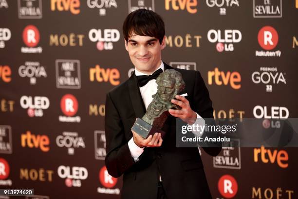 Actor Eneko Sagardoy poses with his award with the movie "Handia" during the 32th edition of the Goya Awards ceremony in Madrid, Spain on February...