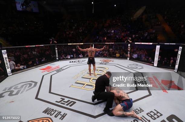 Thiago Santos of Brazil celebrates his victory over Anthony Smith in their middleweight bout during the UFC Fight Night event at Mangueirinho Arena...