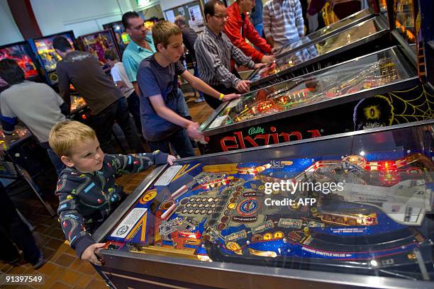 Three year old Xandro from Eindhoven, The Netherlands, is the youngest participant of the Dutch Pinball Open on October 4, 2009 in Veldhoven, The...