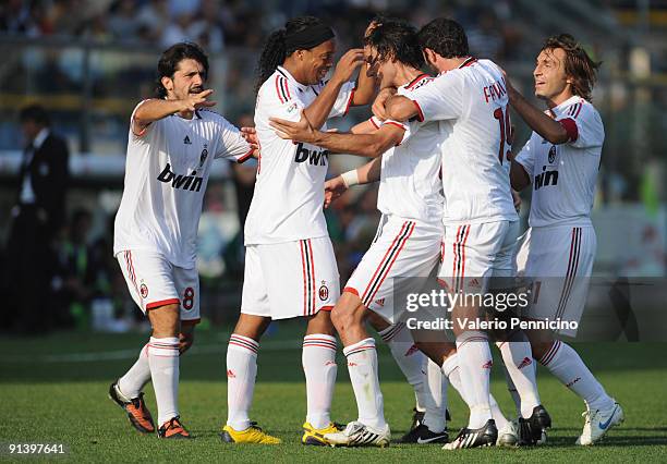 Milan players celebrate the goal by Ronaldinho during the Serie A match between Atalanta BC and AC Milan at Stadio Atleti Azzurri d'Italia on October...