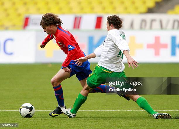 Georgi Schennikov of PFC CSKA Moscow battles for the ball with Maksim Zhavnerchik of FC Kuban Krasnodar during the Russian Football League...