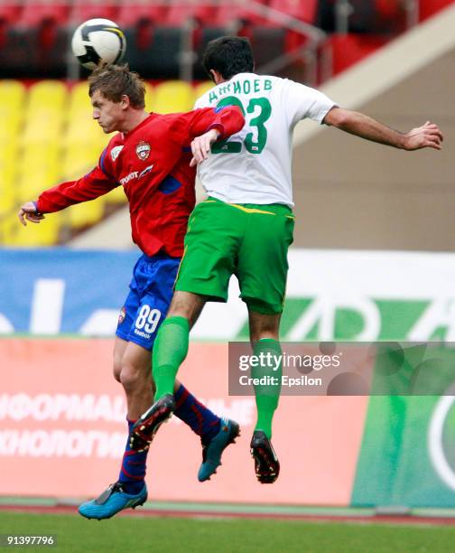 Tomas Necid of PFC CSKA Moscow battles for the ball with Georgi Dzhioyev of FC Kuban Krasnodar during the Russian Football League Championship match...