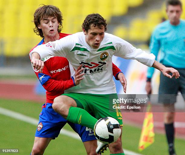 Georgi Schennikov of PFC CSKA Moscow battles for the ball with Maksim Zhavnerchik of FC Kuban Krasnodar during the Russian Football League...