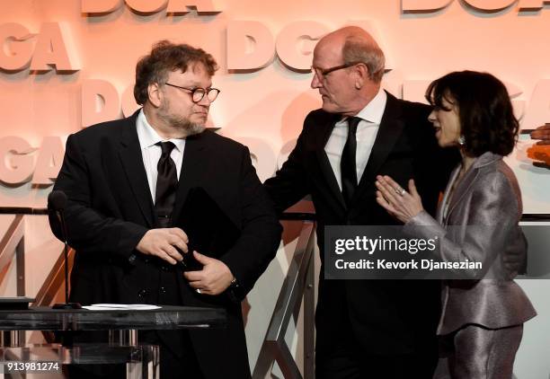 Director Guillermo del Toro accepts the Nomination Medallion for Outstanding Directorial Achievement in Feature Film for 'The Shape of Water' from...