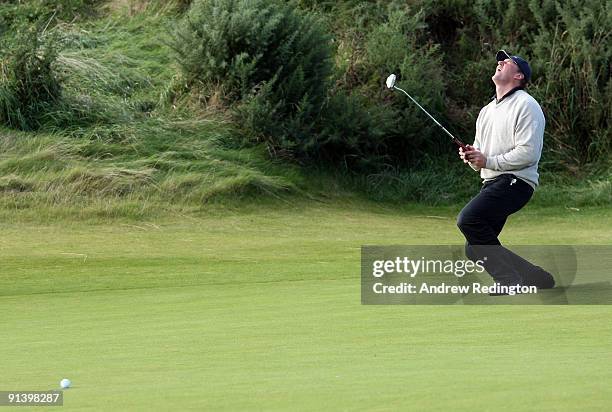 Sir Matthew Pinsent reacts after just missing his putt on the 17th green during the third round of The Alfred Dunhill Links Championship at...