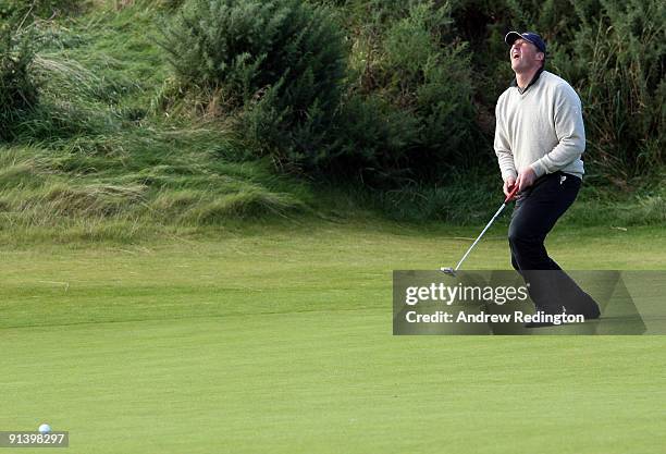 Sir Matthew Pinsent reacts after just missing his putt on the 17th green during the third round of The Alfred Dunhill Links Championship at...